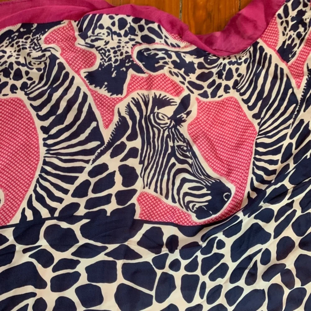 Large 100 percent silk zebras rap/scarf.‎ Used twice.